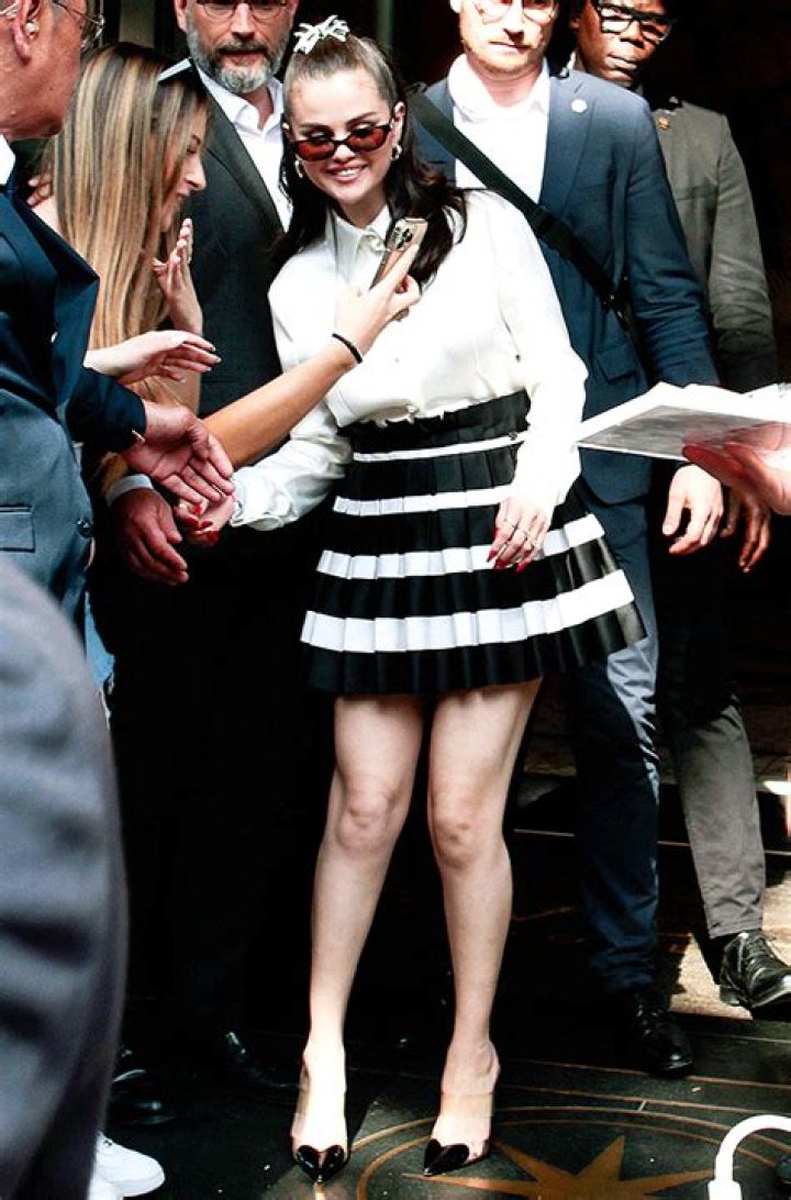 Selena Gomez’s Striped Mini Skirt In Paris: Photos – Hollywood Life