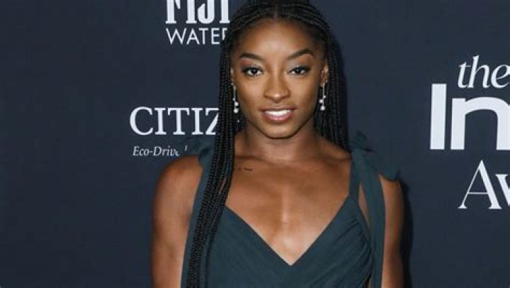 Simone Biles Models Neon Green Bikini & Matching Bucket Hat In Sexy New Photo