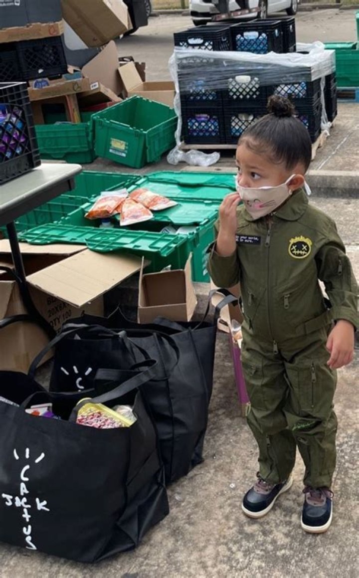 Stormi Webster, 2, Masks Up To Volunteer At Dad Travis Scott’s Houston Toy Drive For Underprivileged Kids