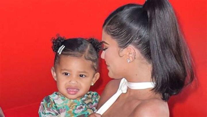 Stormi Webster, 2, Shows Off Her Messy T-Shirt After Dinner & Rocks Bedazzled Monogram Sunglasses