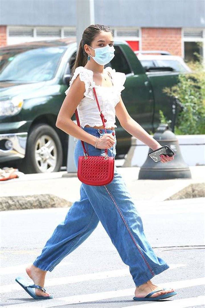 Suri Cruise, 14, Looks Just Like Mom Katie Holmes As She Picks Her Dogs Up From The Groomer — Pics