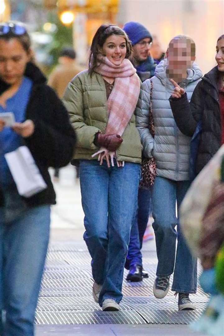 Suri Cruise, 16, Is Stylish In Puffer Coat & Jeans While Out With Friends In NYC