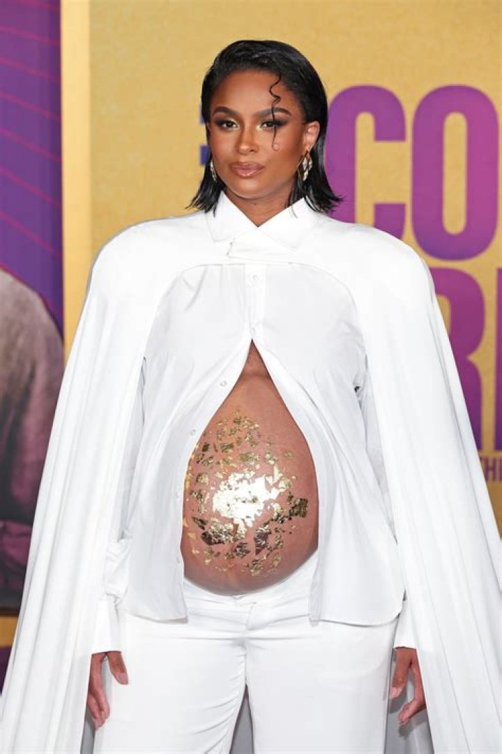 Tiny Harris’ Pregnant Daughter Zonnique, 24, Shows Off Her Growing Baby Bump & Cuddles With BF Bandhunta Izzy