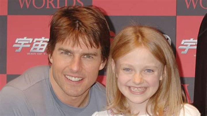 Tom Cruise Gave Dakota Fanning Her First Cellphone While Filming ‘War of the Worlds’