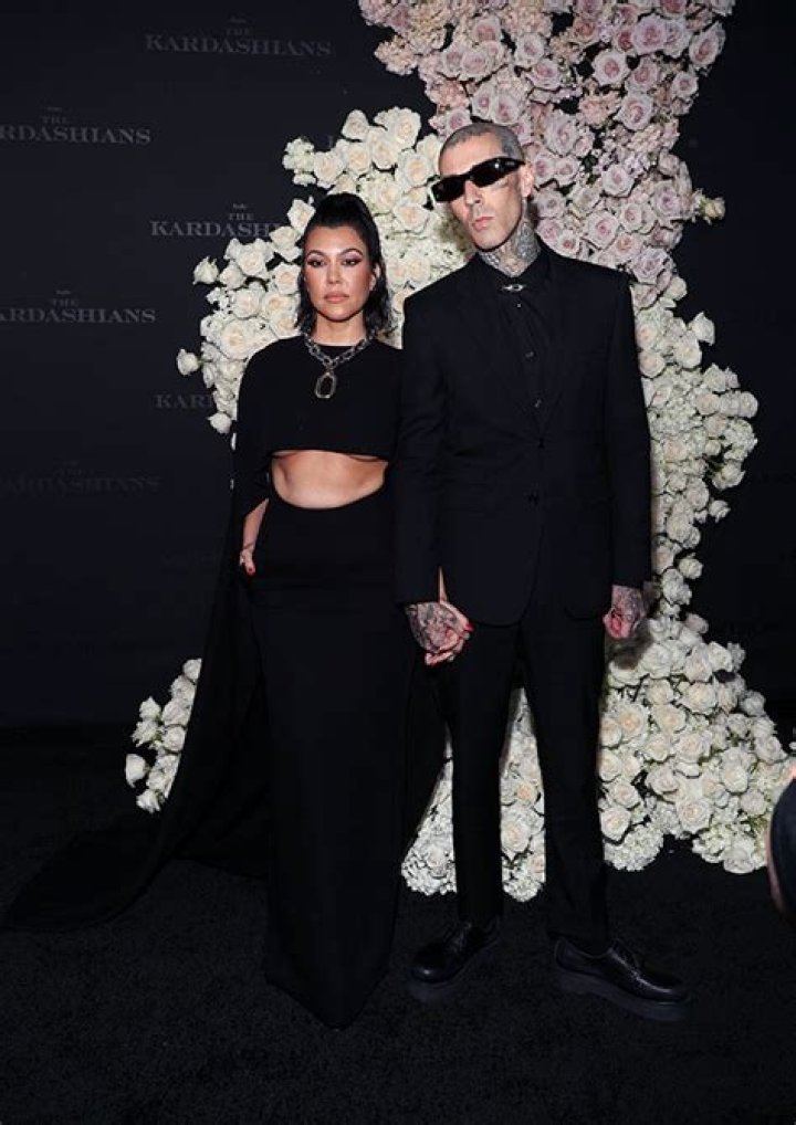 Travis Barker Sniffs Kourtney Kardashian’s Feet As She Lays On Top Of Him: Photo