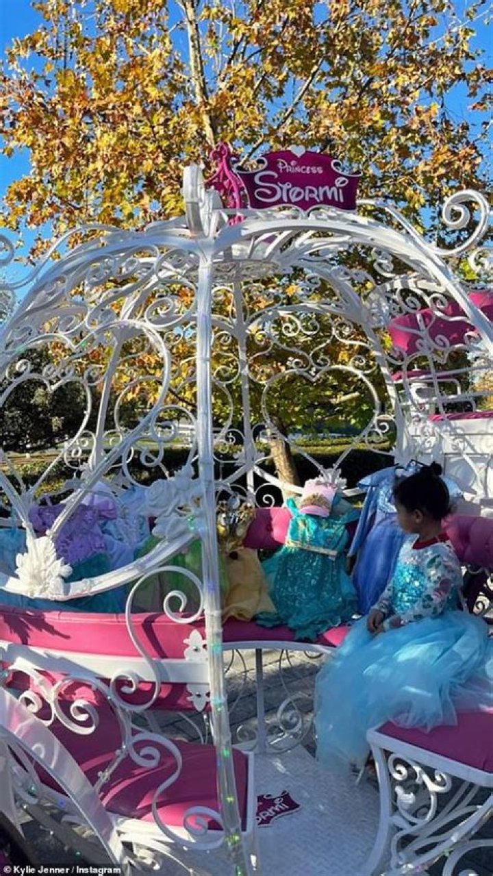 Travis Scott Gifts ‘Princess Stormi’ A Cinderella Carriage Filled With Dresses On XMas: See Pics & Video