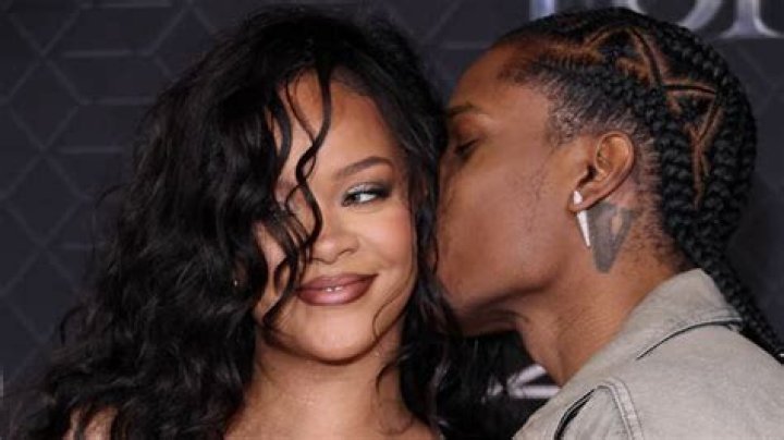 Travis Scott Kisses Rihanna’s Neck At NYFW Party — See The PDA Pics